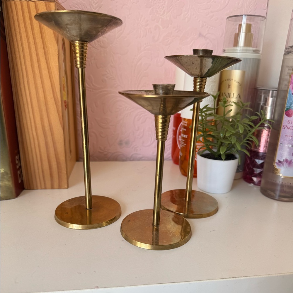 Vintage brass trio of candle holders
